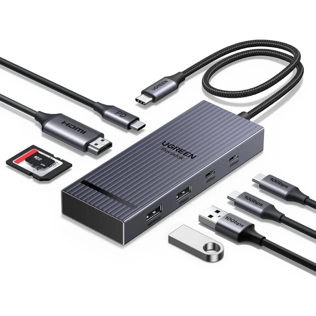 Hub UGREEN Revodok 8-in-1 USB-C, một phụ kiện nhỏ gọn đa năng với nhiều cổng kết nối như USB-C, USB-A, HDMI và khe đọc thẻ, tăng cường khả năng cho laptop và Chromebook.
