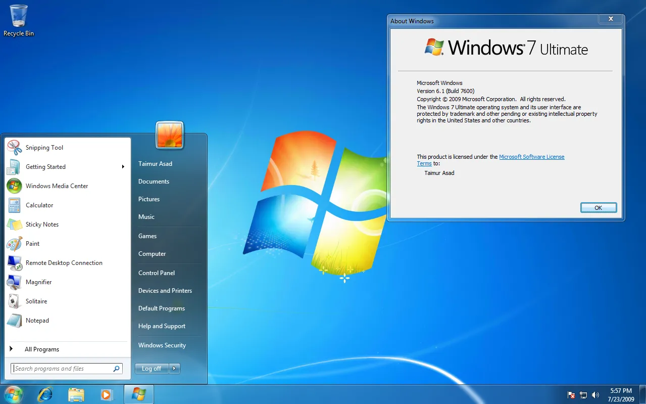Giao diện Windows 7 cổ điển với cửa sổ About Windows và Start Menu truyền thống, hệ điều hành được VxKex NEXT hỗ trợ.