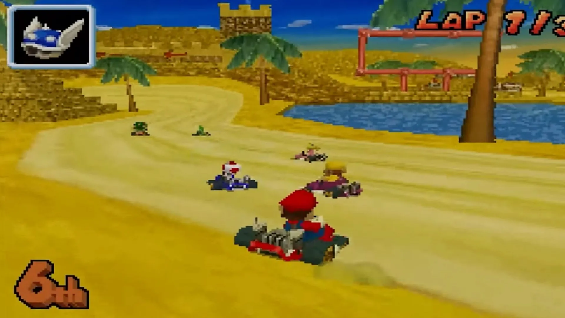 Ảnh chụp màn hình game Mario Kart DS với Mario đang đua và vỏ xanh (Blue Shell) trong cuộc đua kịch tính.