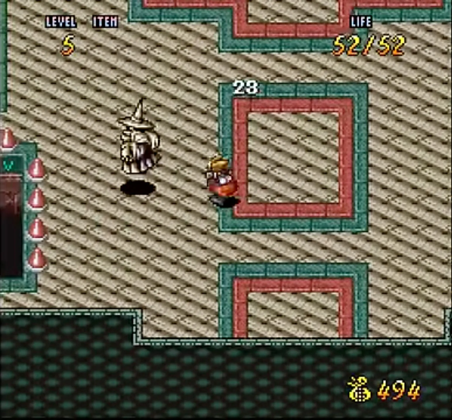 Ảnh chụp màn hình game Terranigma trên SNES, nhân vật chính Ark đang chiến đấu với quái vật trong một khung cảnh hang động.
