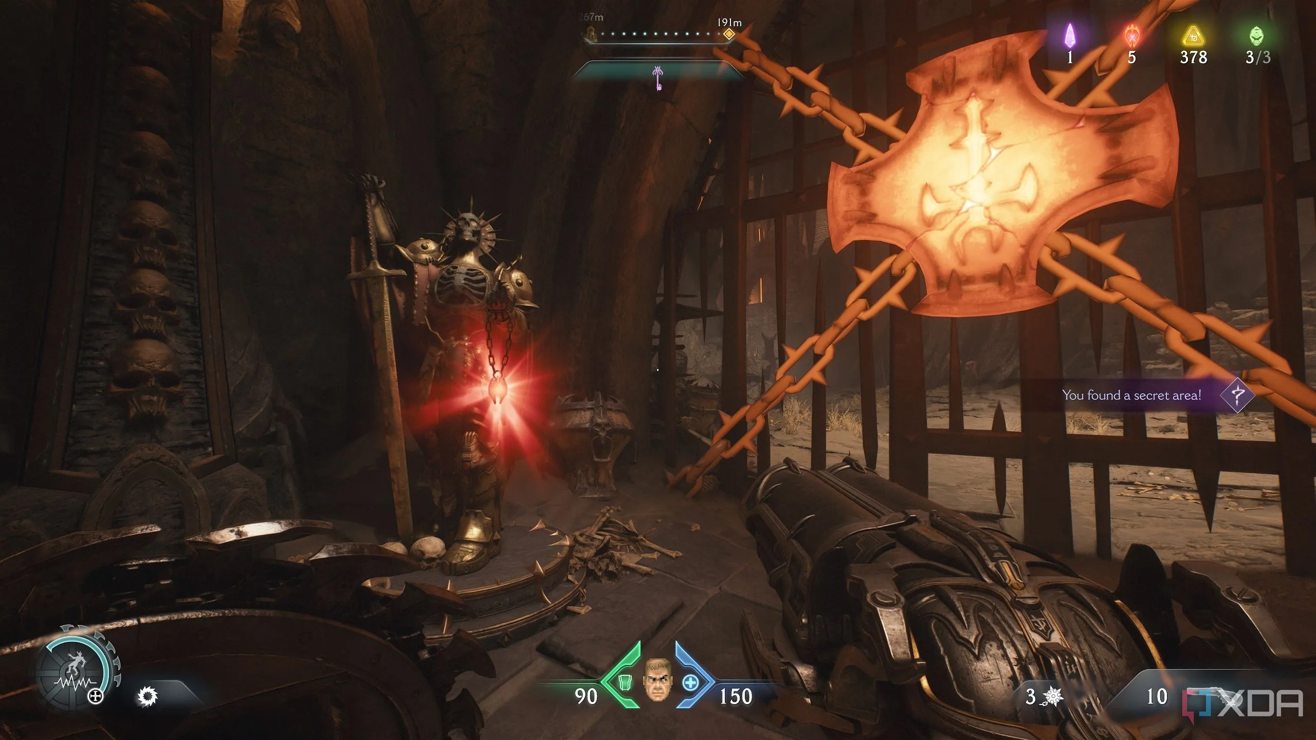Bức tượng hồng ngọc bên cạnh cây thánh giá kim loại nóng chảy trong Doom The Dark Ages Chapter 10