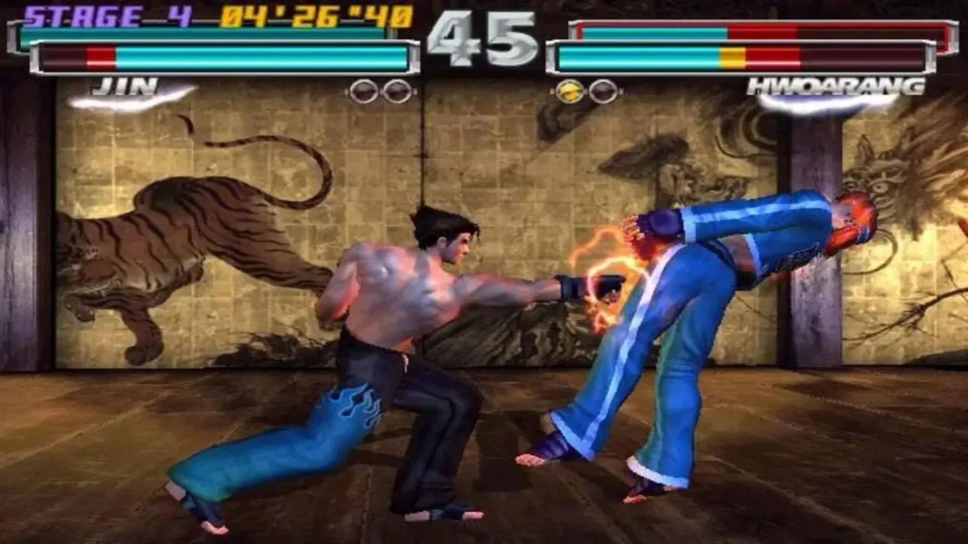 Cảnh trận đấu giữa Jin và Hwoarang trong Tekken Tag Tournament, minh họa kỹ năng tư duy 3D