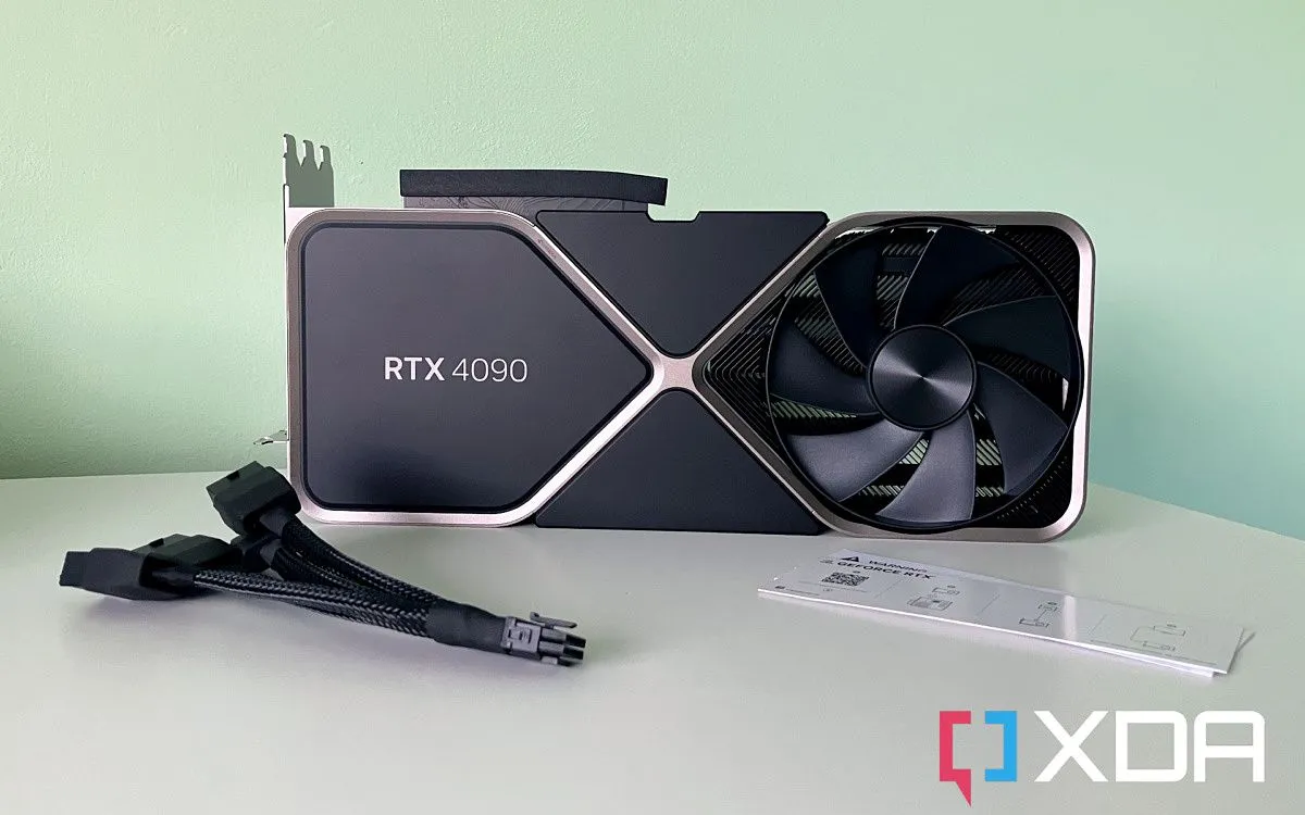 Card đồ họa Nvidia GeForce RTX 4090 với các dây cáp nguồn, minh họa sức mạnh của GPU đơn hiện đại