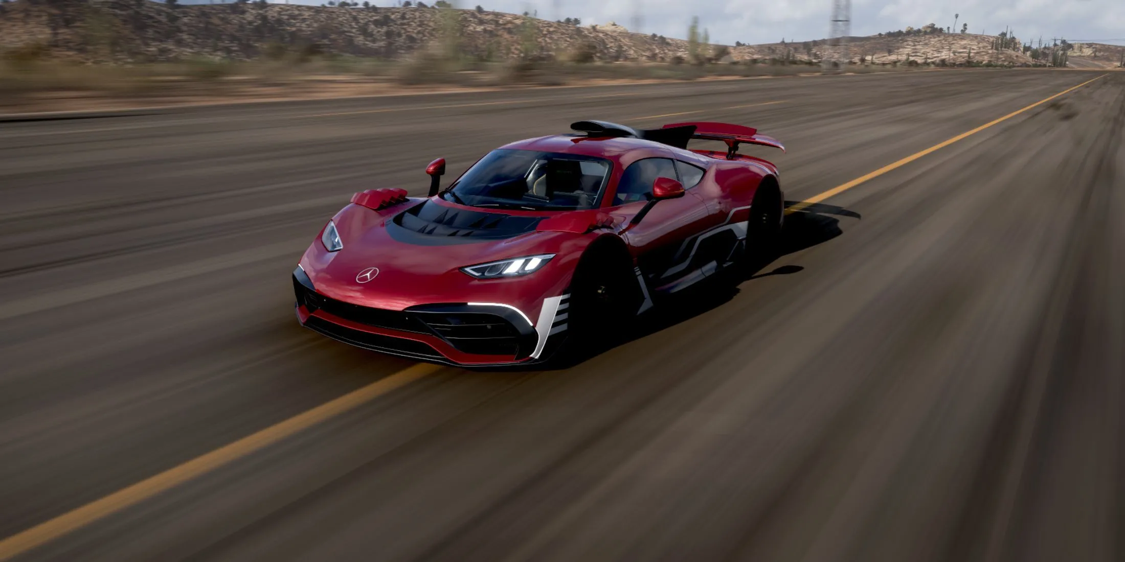 Chiếc Mercedes-AMG ONE màu đỏ đang thể hiện tốc độ trong môi trường game Forza Horizon 5
