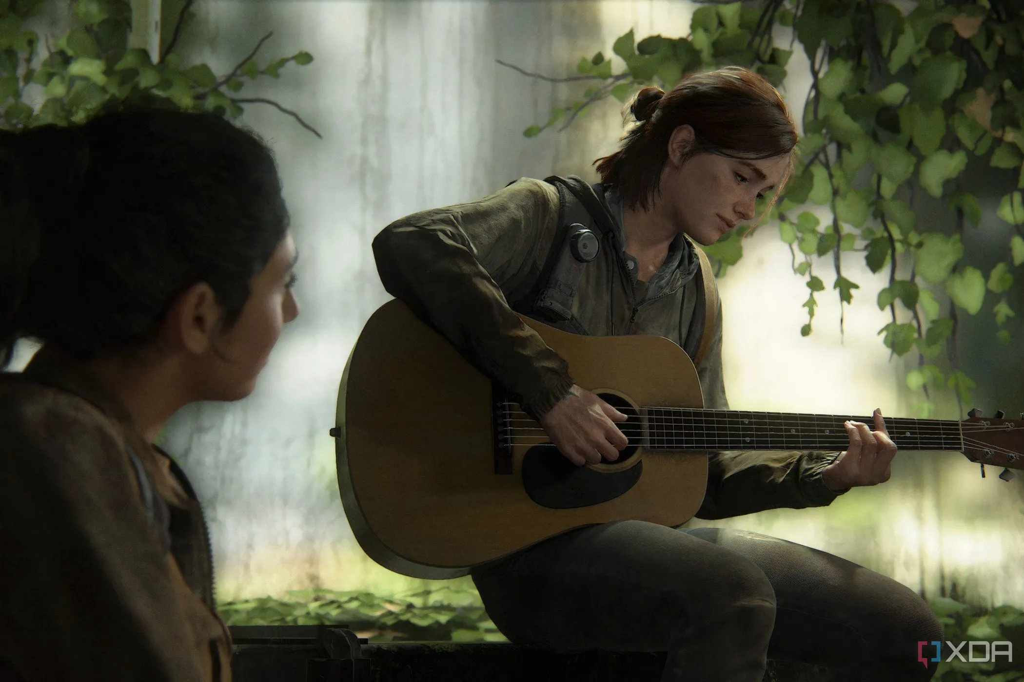 Ellie đang chơi guitar trong một cảnh từ The Last of Us Part II, hình ảnh gợi nhắc về sự mong đợi dành cho The Last of Us Part III trên PlayStation