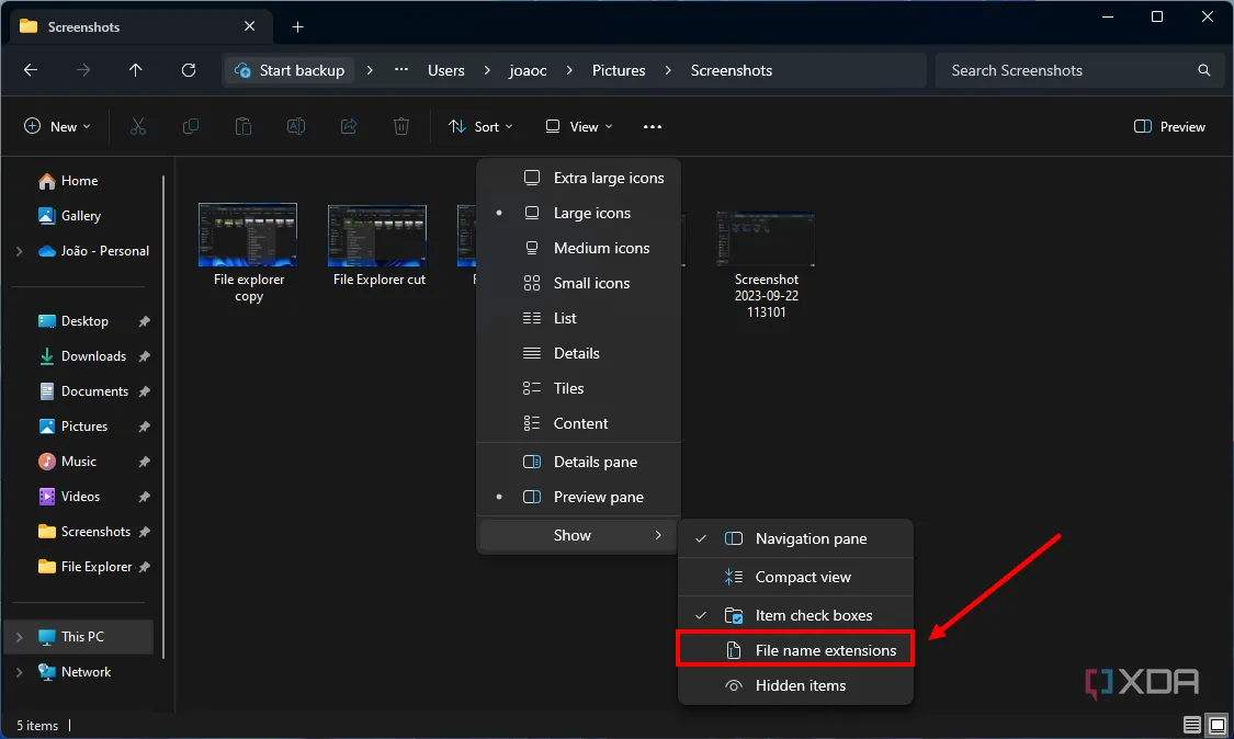 Giao diện File Explorer trên Windows 11 với nút &quot;Show file name extensions&quot; được làm nổi bật