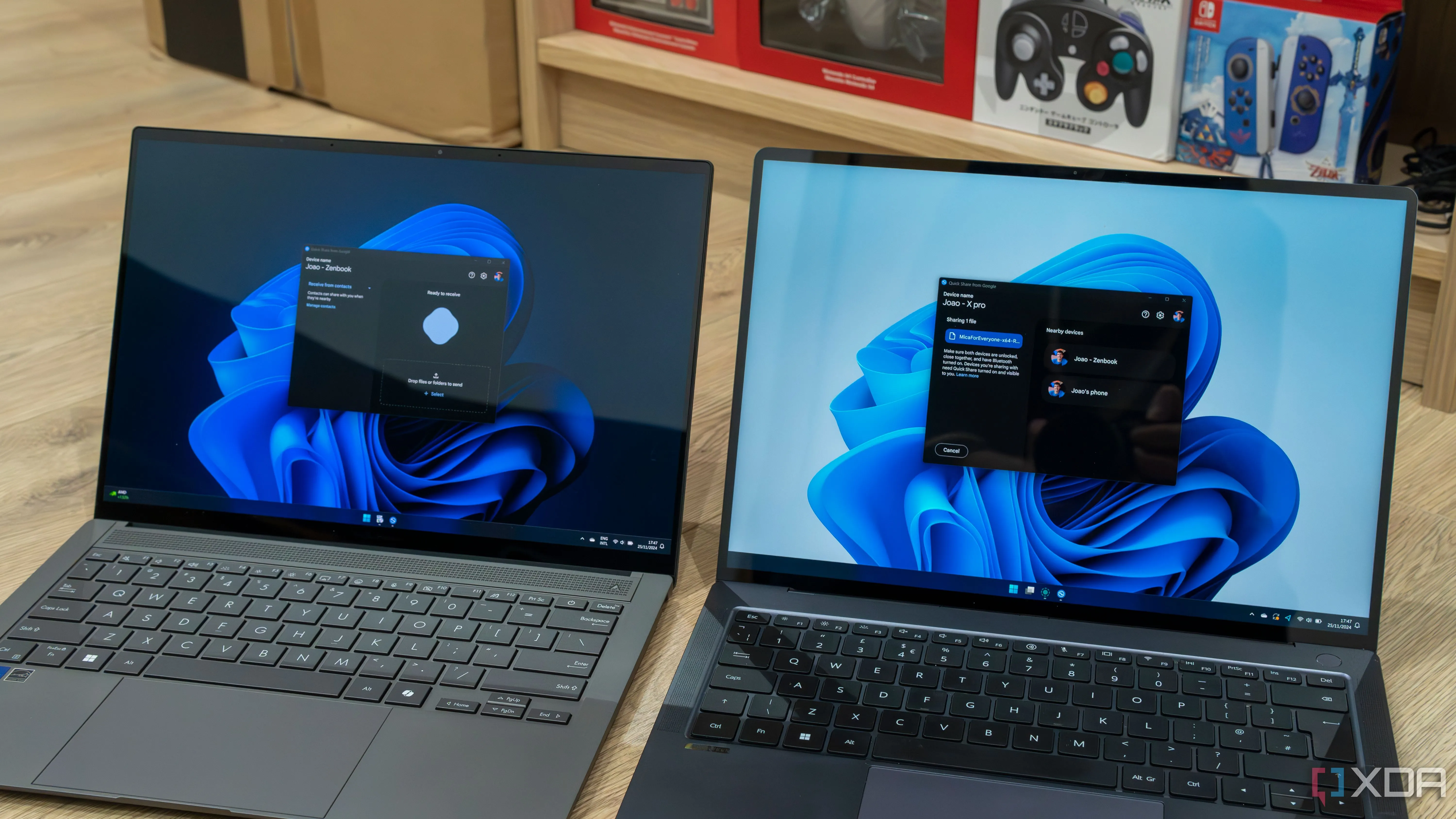 Hai laptop Windows 11 đang chia sẻ file qua Quick Share hoặc tính năng chia sẻ lân cận