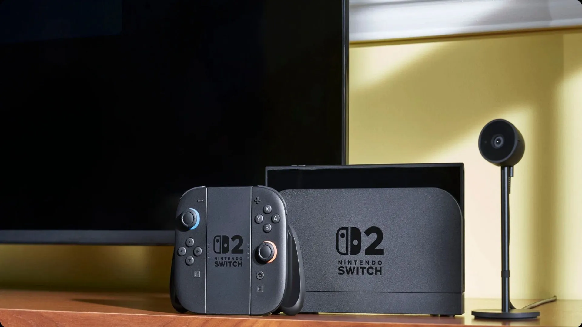 Hình ảnh minh họa Nintendo Switch 2 với tay cầm và micro, tượng trưng cho tính năng giao tiếp và voice chat được cải tiến