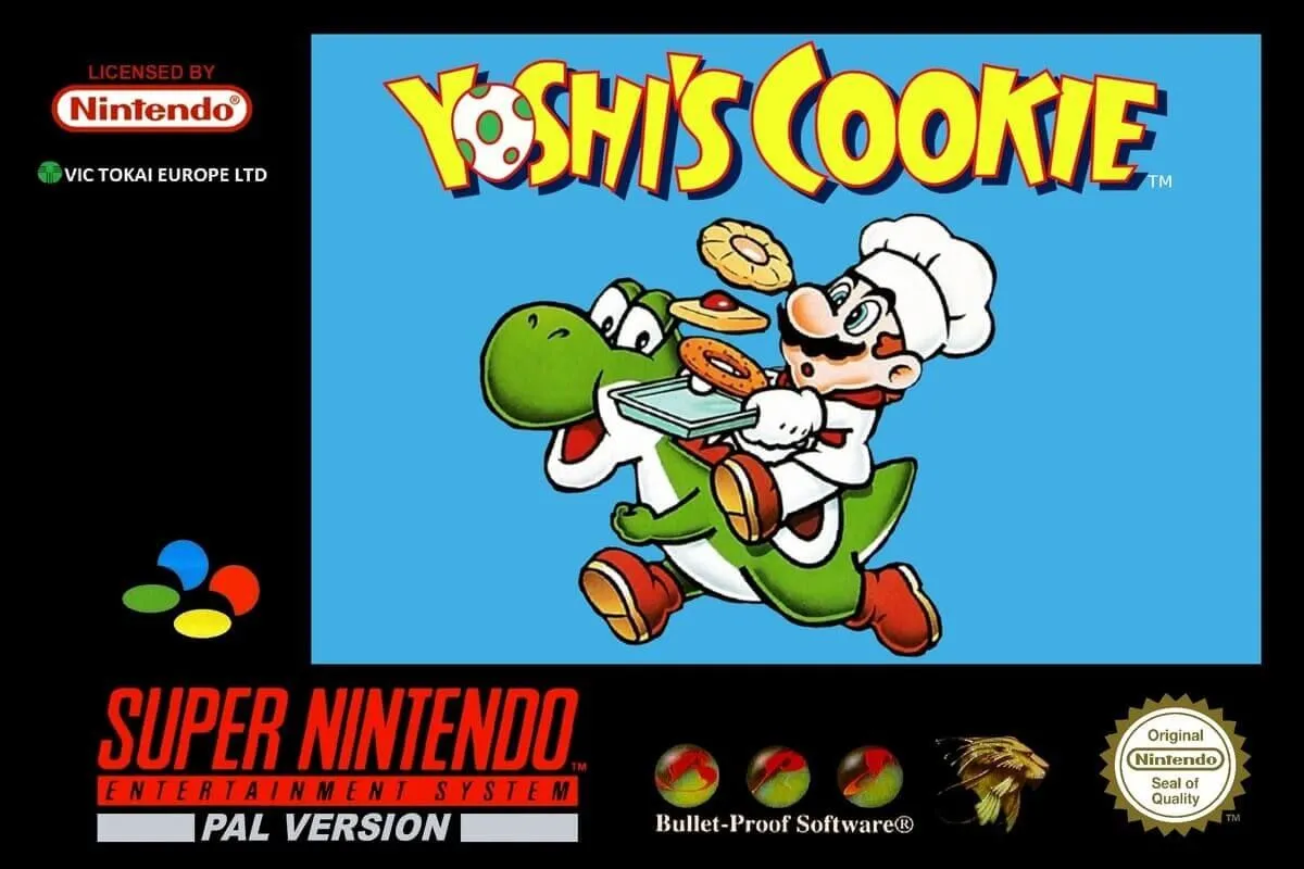 Hộp game Yoshi's Cookie phiên bản PAL cho SNES, với hình ảnh Yoshi và Mario bên những chiếc bánh quy nhiều màu sắc