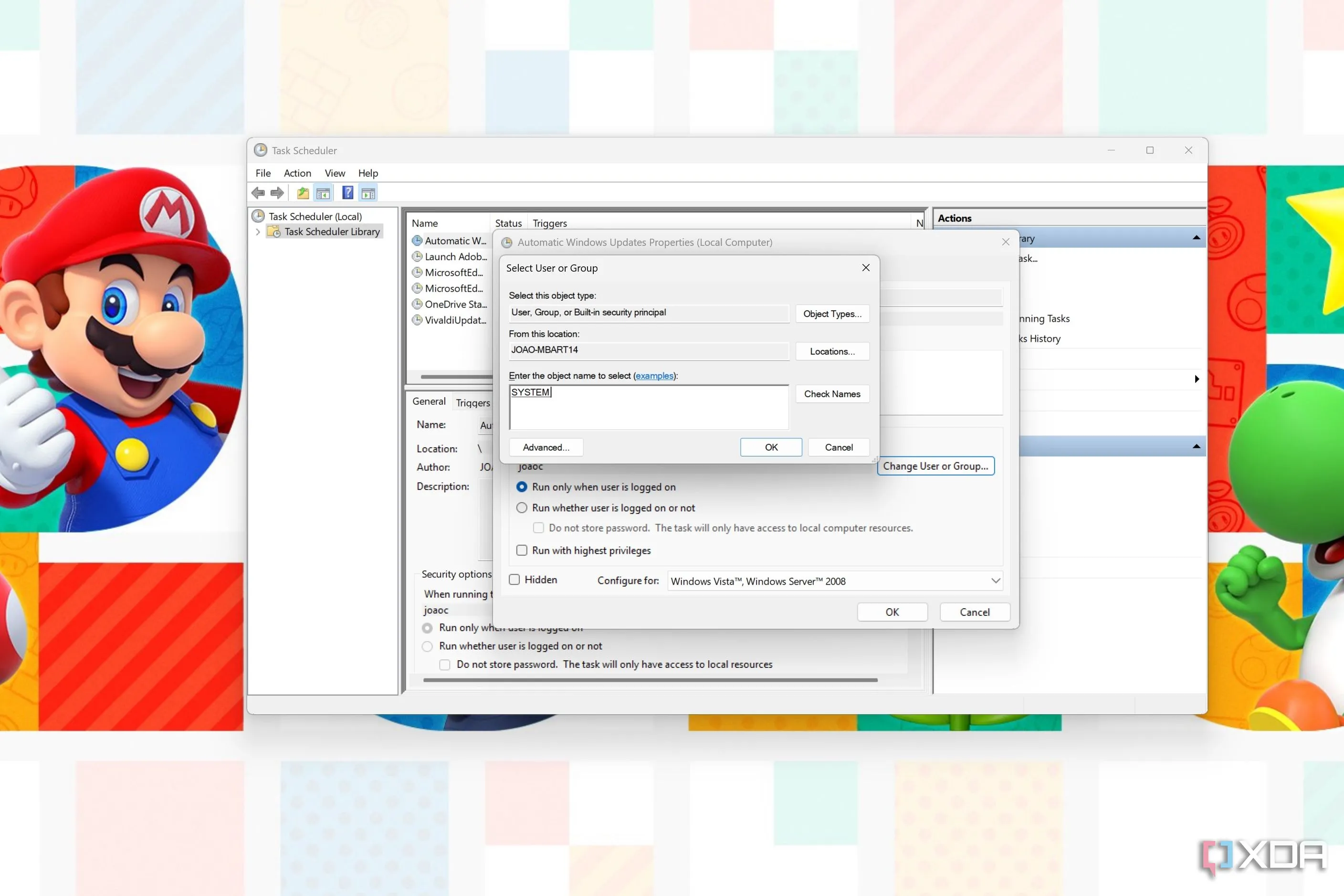 Hộp thoại Task Scheduler để chọn người dùng chạy tác vụ, với &quot;System&quot; được nhập