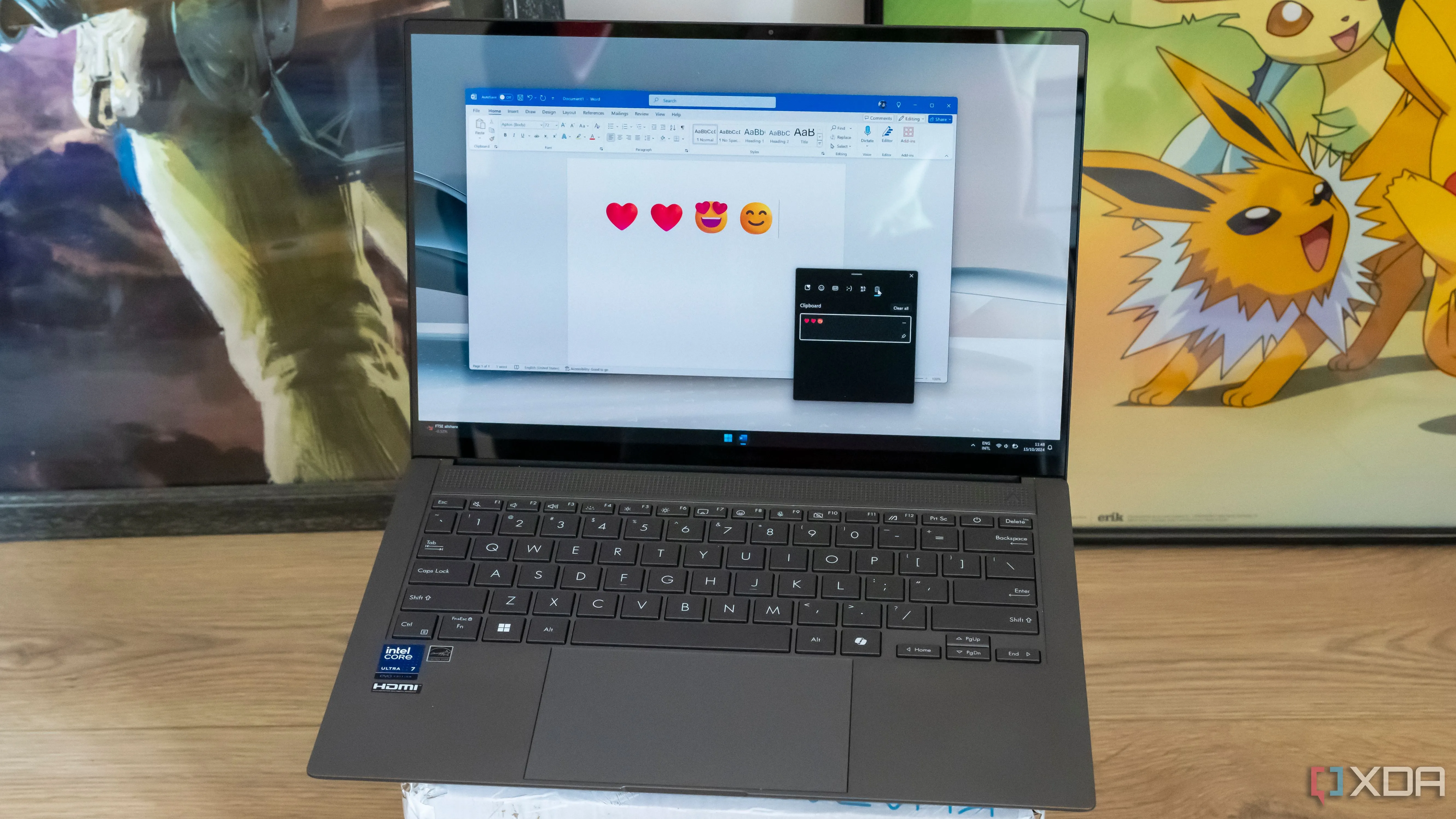 Laptop hiển thị Microsoft Word với các biểu tượng cảm xúc và bảng điều khiển clipboard, minh họa cho khả năng xử lý tài liệu của ConvertX