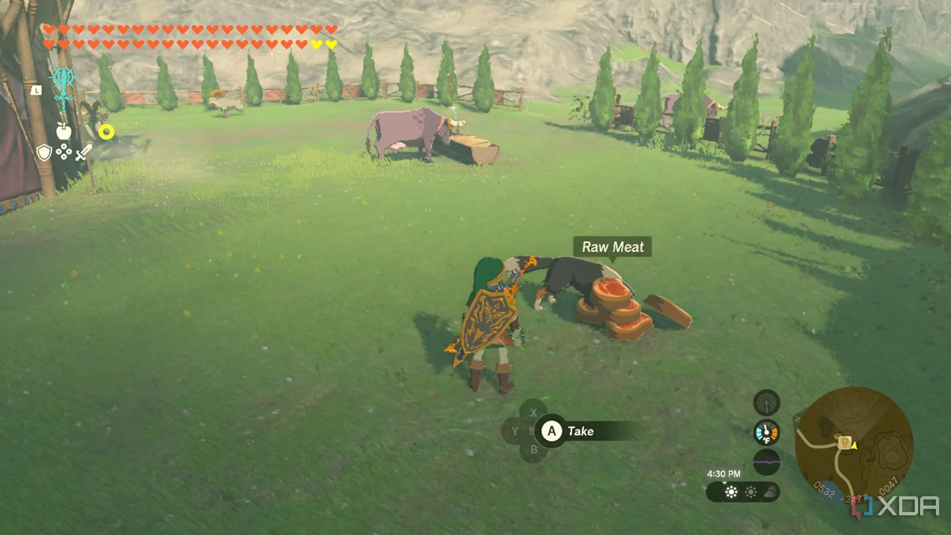 Link đang cho chú chó thân thiện ăn tại chuồng ngựa trong The Legend of Zelda: Tears of the Kingdom để tìm kho báu