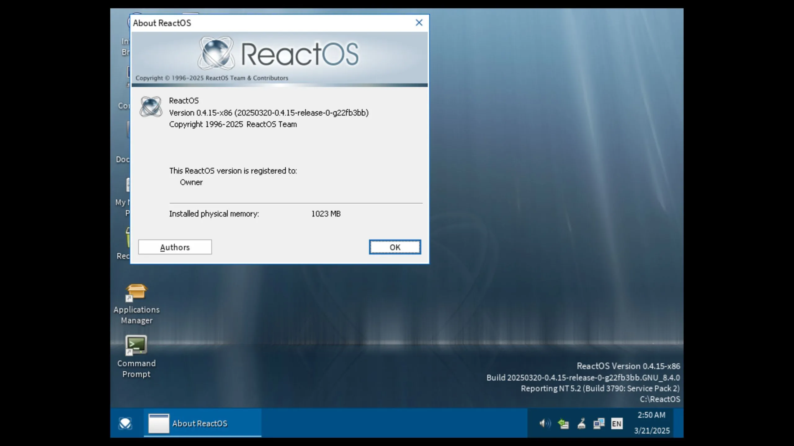 Màn hình desktop của ReactOS 0.4.15 với giao diện Mizu mặc định và các ứng dụng hệ thống