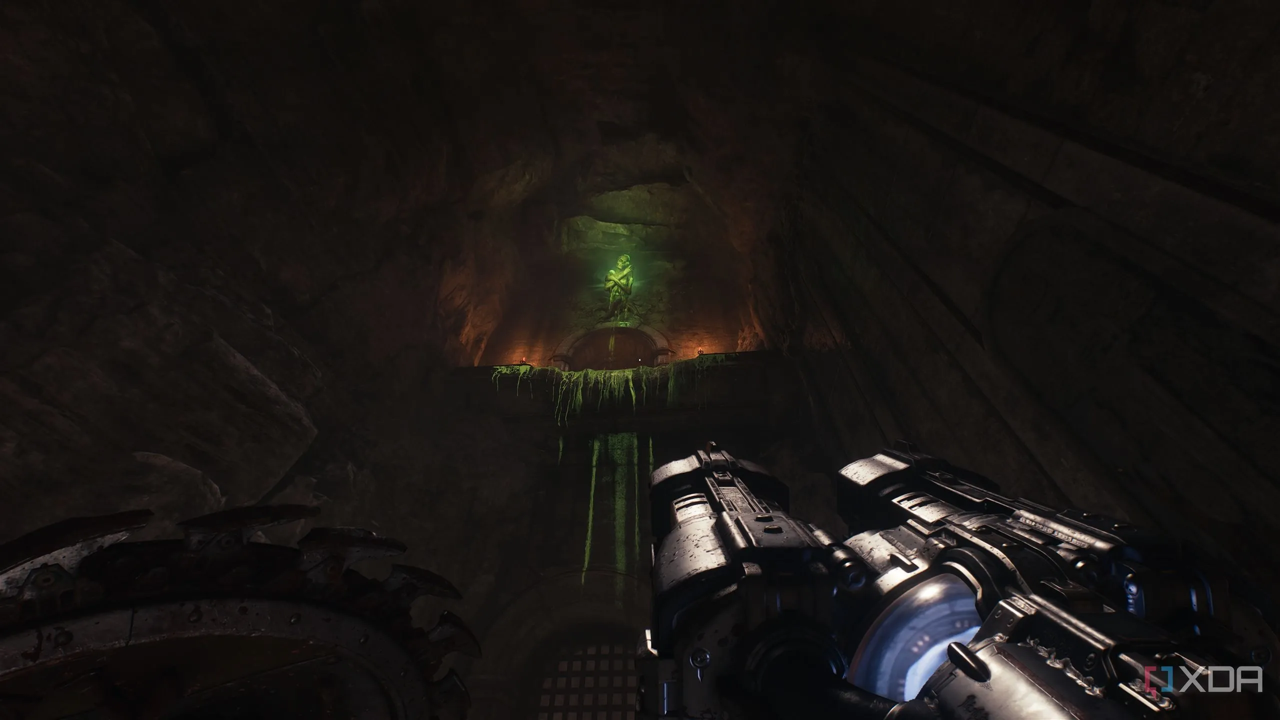 Một nút thịt xanh cao trên tường trong khu vực gore portal 5 của Doom The Dark Ages