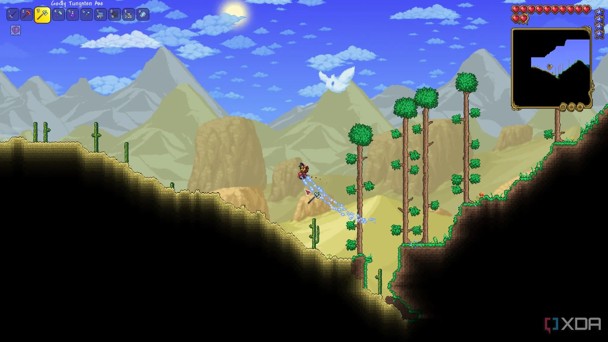 Người chơi khám phá quần xã sinh vật sa mạc trong Terraria, thể hiện đồ họa pixel đặc trưng.