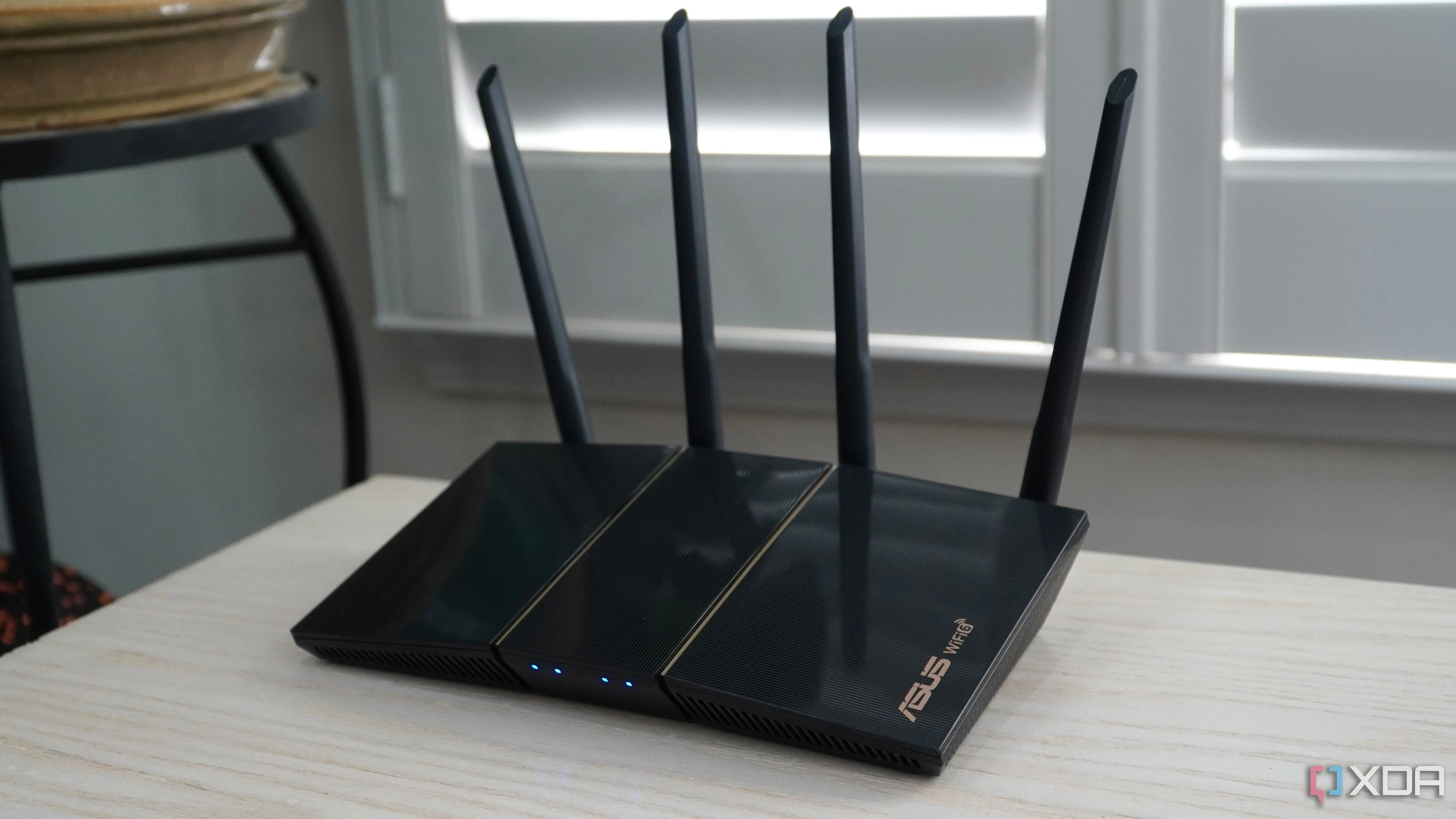 Router Asus RT-AX57 AX3000 Wi-Fi 6, minh họa cho việc tận dụng router cũ để tạo mạng IoT riêng.