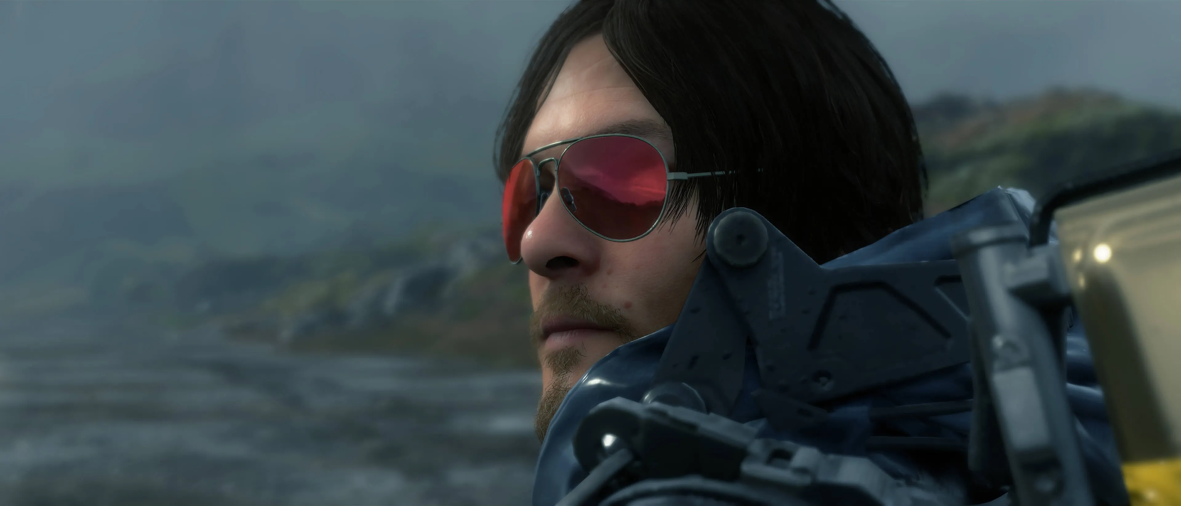 Sam Bridges đeo kính râm trong game Death Stranding